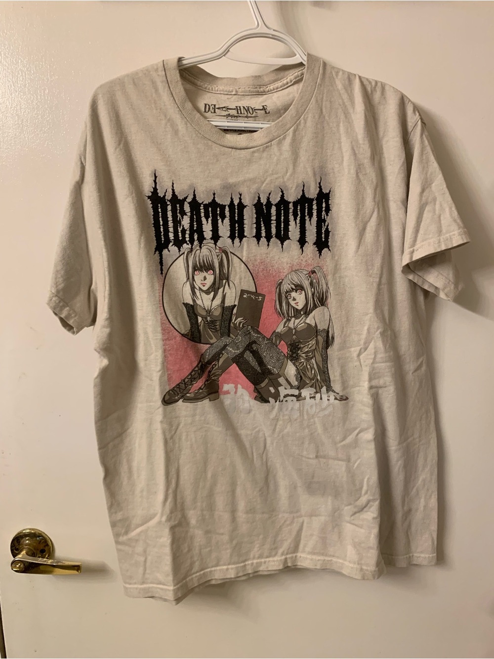 Ripple Junction Cream Anime Graphic Tee with Black and Pink Art. Death Note